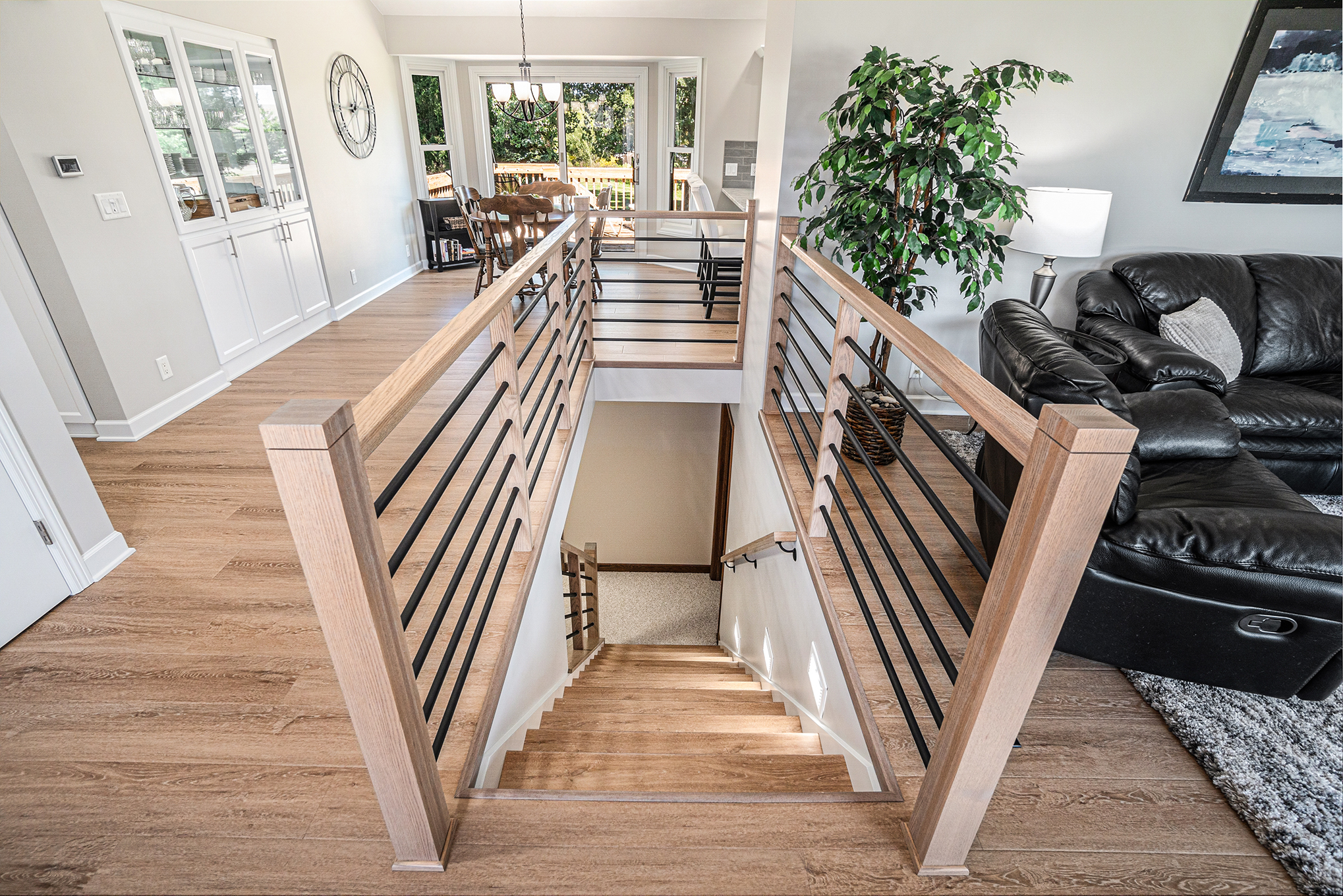 Remodeled Stairway View looking down a remodeled stairway, built by PR Design Build