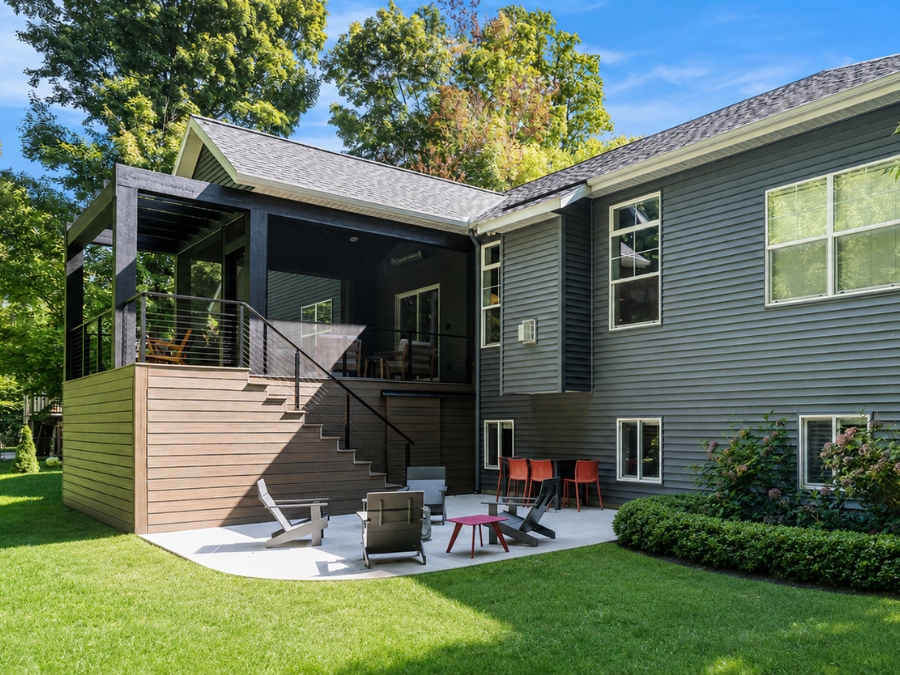 Covered outdoor living structure attached to the home